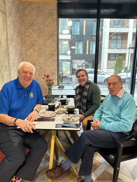 John DeWitt (left), Trae Holland (middle) and a Warsaw, Poland Rotary Club member meet to discuss a plan to help Ukrainian refugee students in Warsaw.